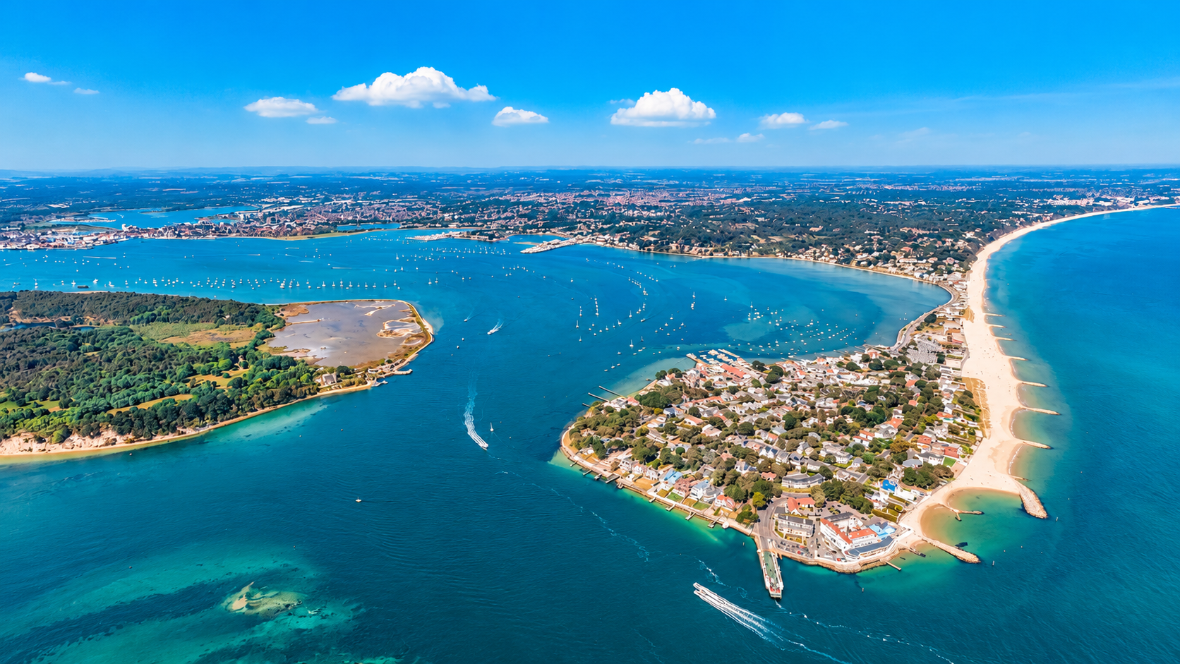 Aerial view of Sandbanks, Poole Harbour and the Dorset coastline